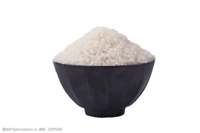 黑色的陶瓷碗里装着大米