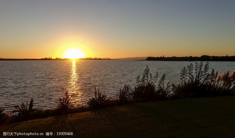 堤坝新西兰海滨夕阳风光